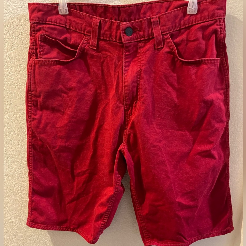 Red Levi’s shorts that are in good condition